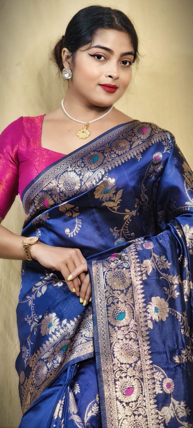 Model wearing a royal blue Banarasi silk saree